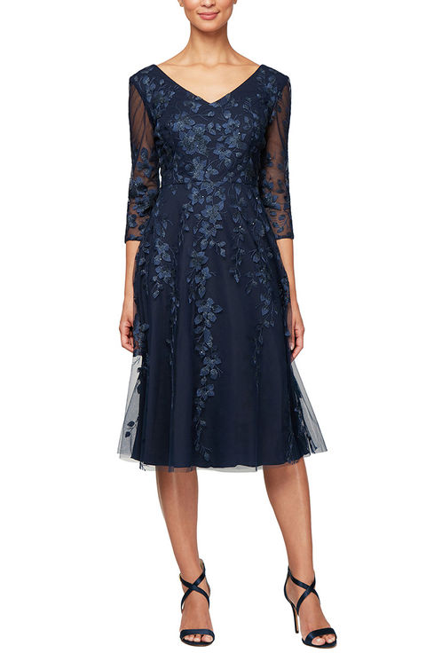 photo of dark blue alex and evenings designer dress