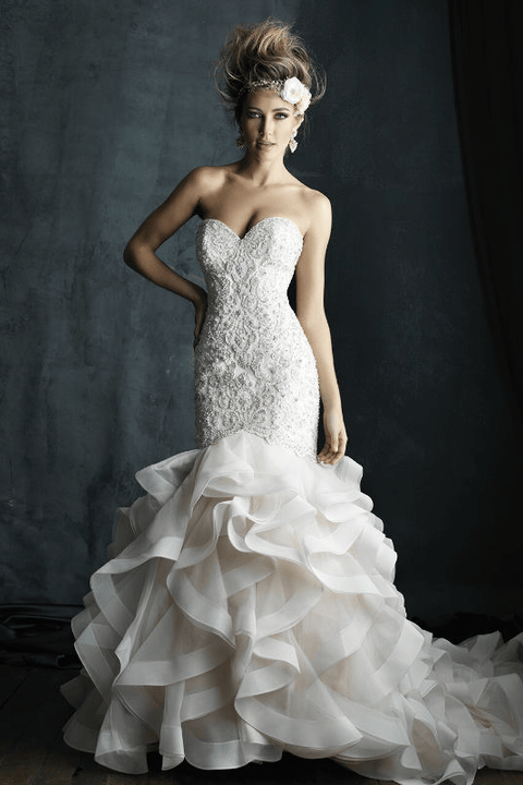 indoor photo of woman wearing white allure couture designer wedding dress