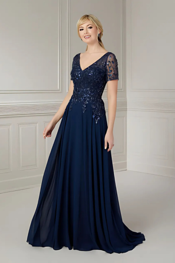 indoor photo of woman wearing blue christina wu designer dress