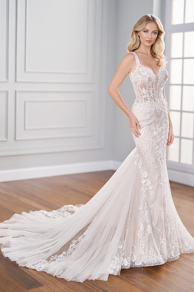 indoor photo of woman wearing white martin thornburg designer wedding dress