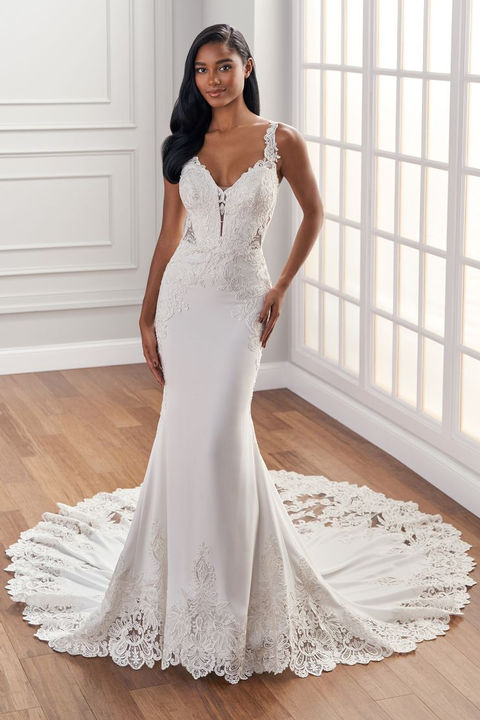 outdoor photo of woman wearing white martin thornburg designer wedding dress