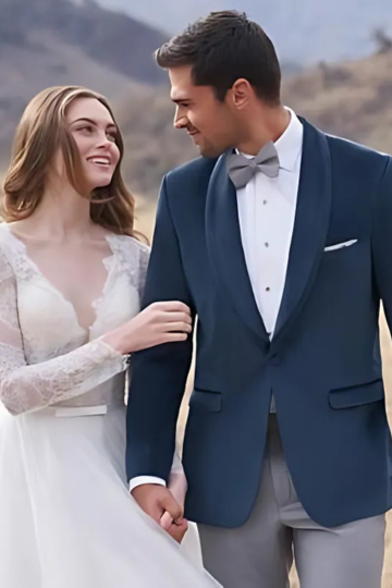 married couple outside wearing designer wedding dress and tuxedo