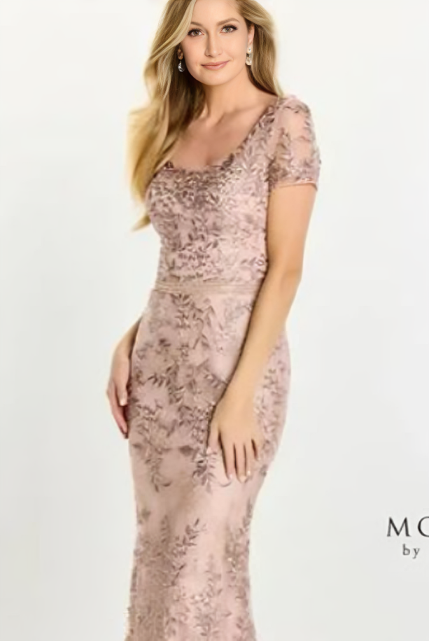 indoor photo of woman wearing peach montage designer dress