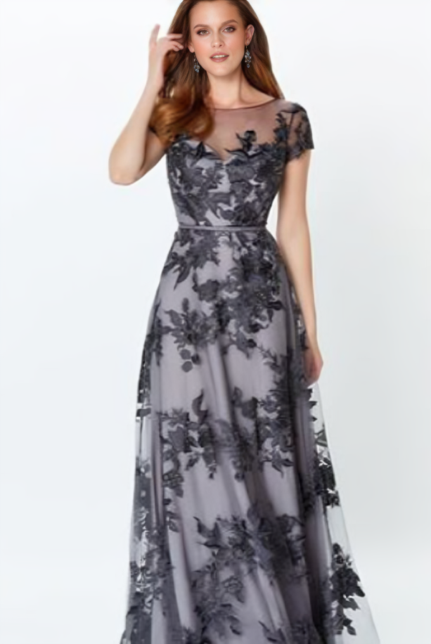 indoor photo of woman wearing black and silver montage designer dress