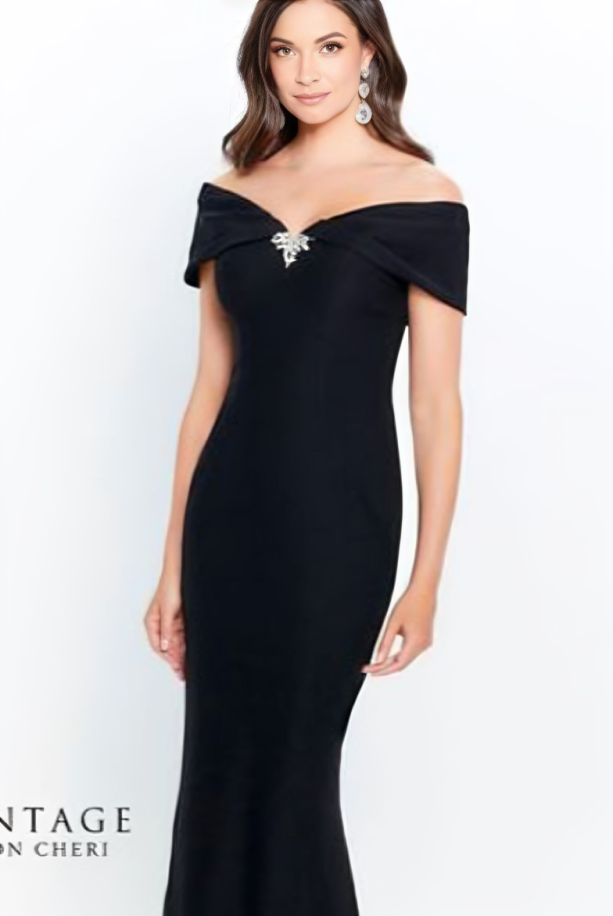 indoor photo of woman wearing black montage designer dress