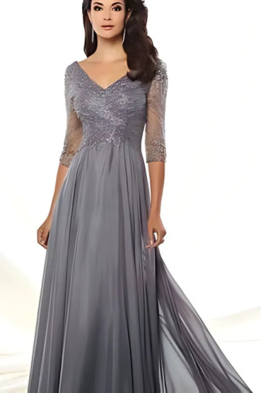 indoor photo of woman wearing grey montage designer dress