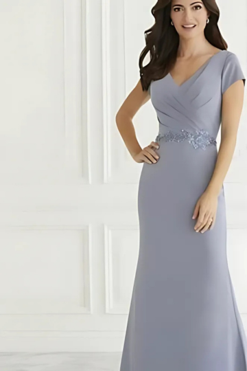 woman wearing light blue christina wu designer mother's dress