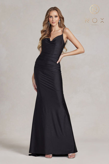indoor photo of woman wearing black prom and homecoming dress