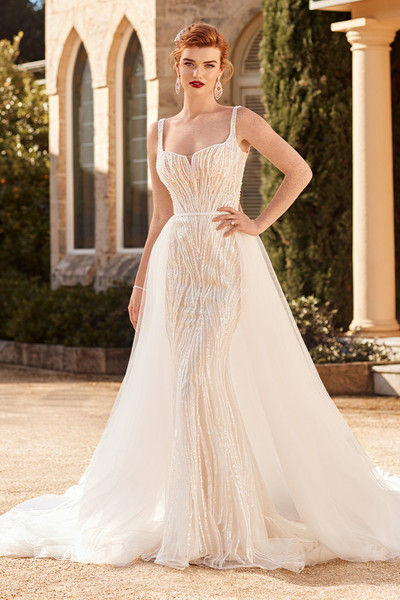 outdoor photo of woman wearing white sophia tolli designer wedding dress