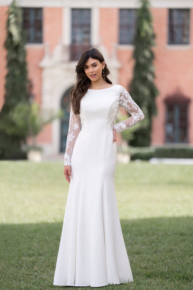 woman wearing white allure romance designer dress 2025 outdoors