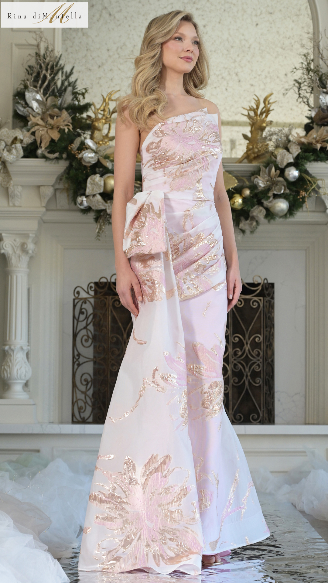 woman wearing blush multi designer rina dimontella mother's dress