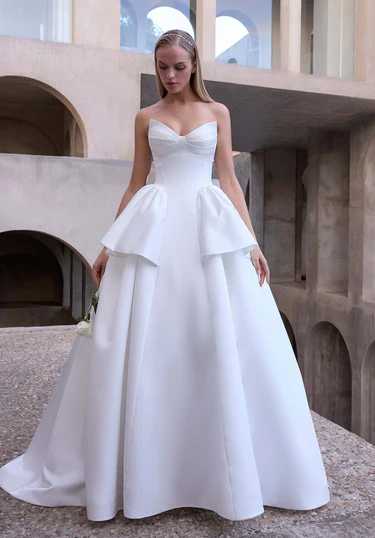 woman wearing white morilee designer wedding dress outdoors
