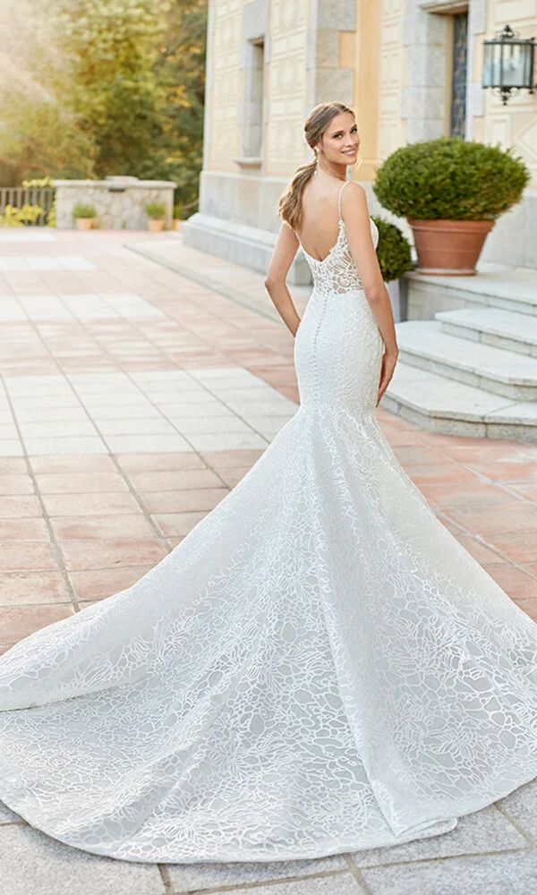 woman wearing white rosa clara designer wedding dress outdoors