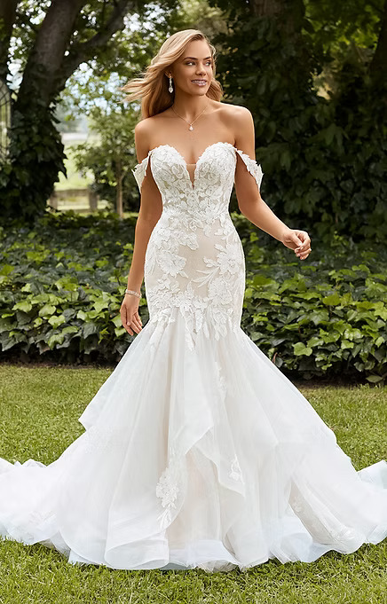 woman wearing white sophia tolli designer wedding dress outdoors
